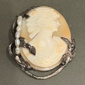 Elegant Cameo Brooch with Silver Accents